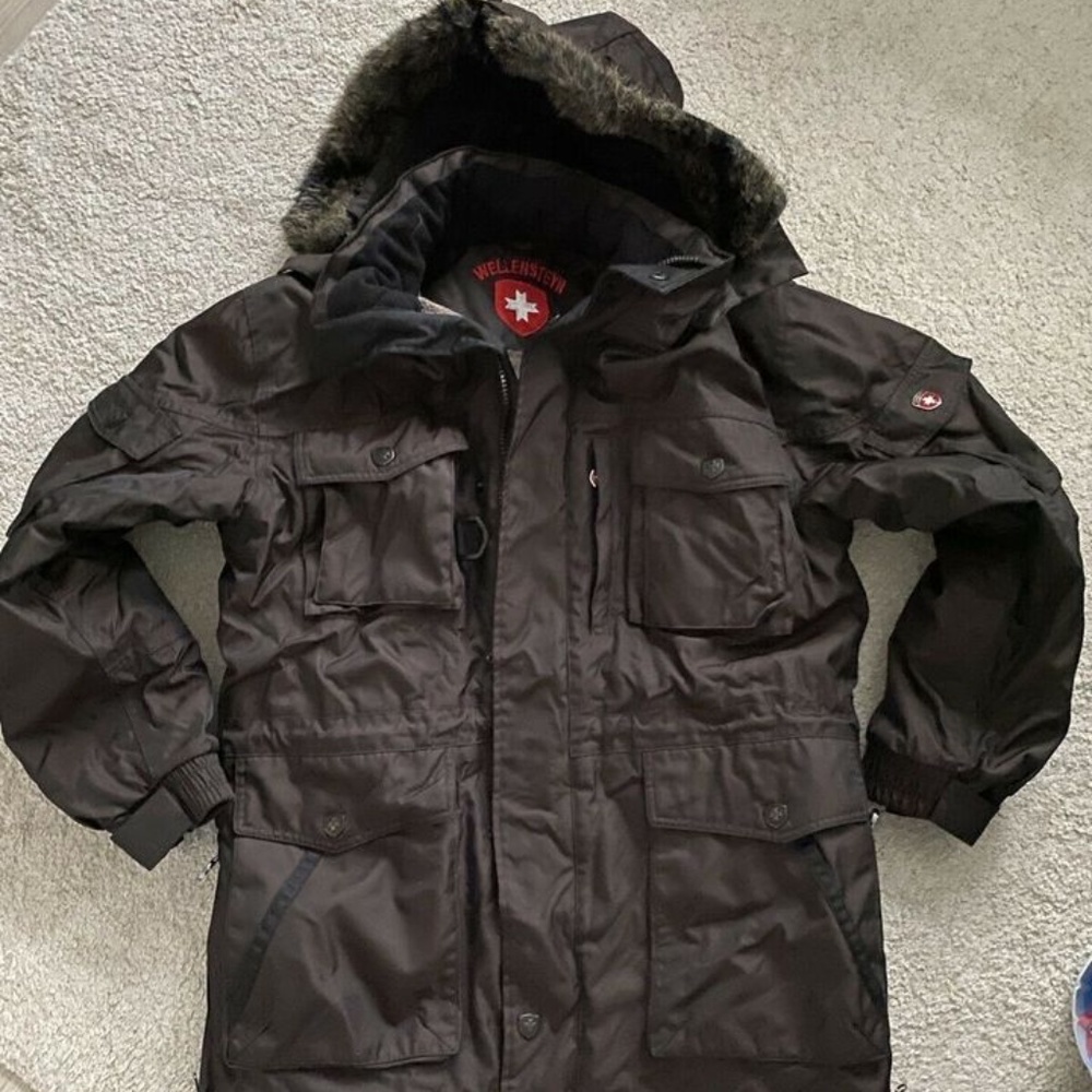 Very warm waterproof parka. Great quality and comfort. Removable hood. Worn once